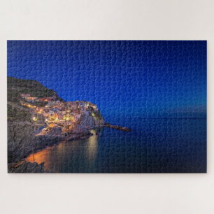 De stad Manarola in de Cinque Terre in de avond Legpuzzel