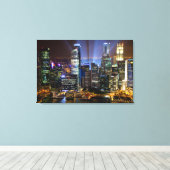 De stad Singapore 's nachts Canvas Afdruk (Insitu (Houten vloer))