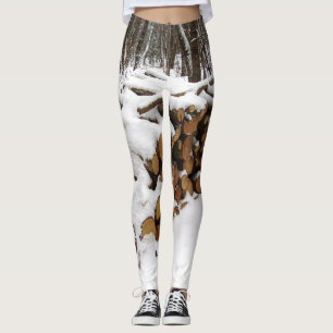 De stapel van het logboek in de Leggings van Bosse