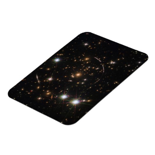 De Sunburst Arc in een enorme sterrenstelsel clust Magneet (Linkerzijde)