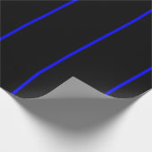 De symbolische dun blauwe lijn op zwart cadeaupapier (Hoek)