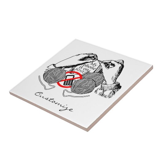 De telefoon is op Knit Thunder_Cove Tegeltje (Zijkant)