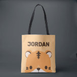 De Tijger van de klap met Persoonlijke Naam Tote Bag<br><div class="desc">Een schattig ontwerp om je dag op te helderen. Dit ontwerp bevat een leuke illustratie van de tijgercartoon met een gepersonaliseerde naam in de bruine moderne sans serif lettertype stijl op de oranje pastelachtergrond. Perfecte persoonlijke cadeaus voor kinderen.</div>