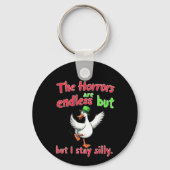 De verschrikkingen zijn eindeloos, maar ik blijf G Sleutelhanger (Voorkant)