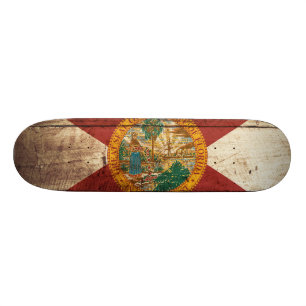 De vlag van Florida op de oude houten graan Skateboard