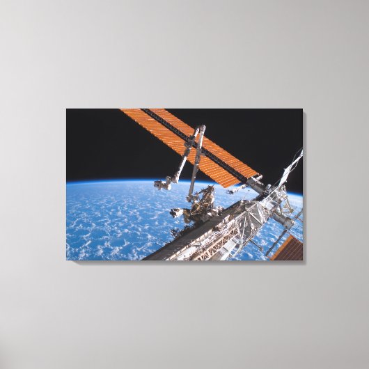 De vleugels van Canadarm2 en zonnepanelen Canvas Afdruk (Voorkant)