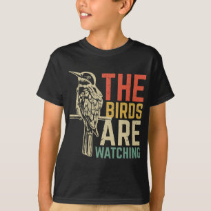 De vogels kijken naar t-shirt