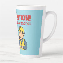 De "VOORZICHTIGHEID! Man aan de telefoon!" Latte M