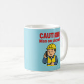 De 'VOORZICHTIGHEID! Man aan de telefoon!' mok (Voorkant rechts)