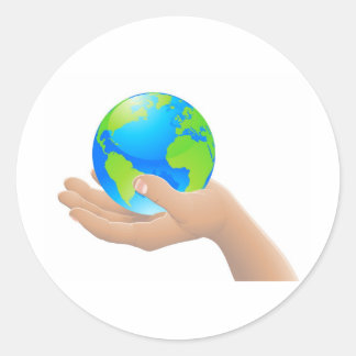 De wereld in je handconcept ronde sticker