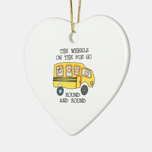 DE WIELEN OP DE BUS KERAMISCH ORNAMENT (Links)