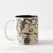 De wijnstokken zijn in bedwang tweekleurige koffiemok (Links)