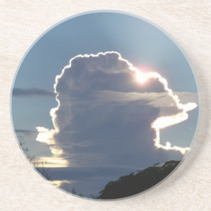 de wolk van de onderkant blokkeert de zon zandsteen onderzetter