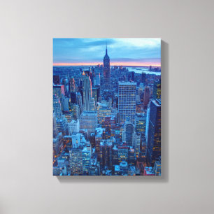 De wolkenkrabbers van Manhattan zijn verlicht Canvas Afdruk