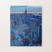 De wolkenkrabbers van Manhattan zijn verlicht Legpuzzel (Verticaal)