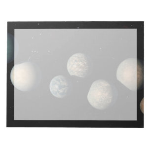 De zeven aardse planeten van Trappist-1 Notitieblok