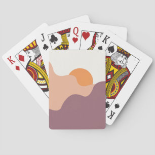 De zon gaat onder achter de paarse heuvels pokerkaarten