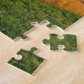 De zon, komt uit prairie als gras legpuzzel (Zijkant)