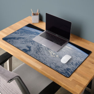 De zon straalt uit op de Stille Zuidzee. Bureaumat