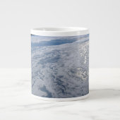 De zon straalt uit op de Stille Zuidzee. Grote Koffiekop (Voorkant)