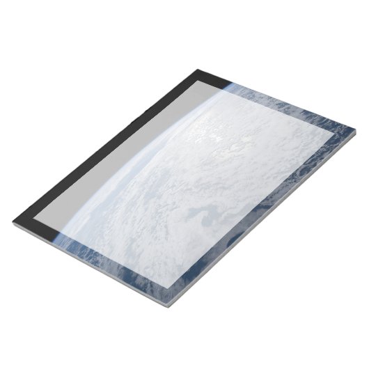 De zon straalt uit op de Stille Zuidzee. Notitieblok (Schuin)