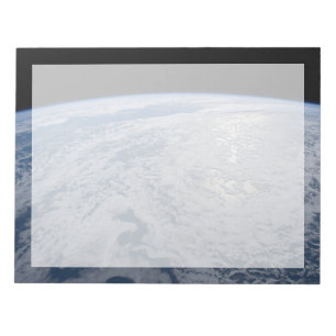 De zon straalt uit op de Stille Zuidzee. Notitieblok