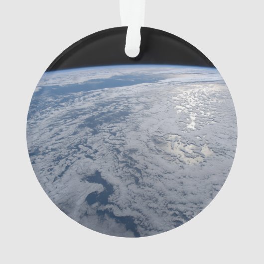 De zon straalt uit op de Stille Zuidzee. Ornament (achterkant)