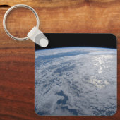 De zon straalt uit op de Stille Zuidzee. Sleutelhanger (Voorkant)