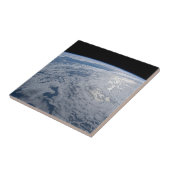 De zon straalt uit op de Stille Zuidzee. Tegeltje (Zijkant)