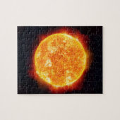 De zon toont zonnevlammen tegen een ster legpuzzel (Horizontaal)