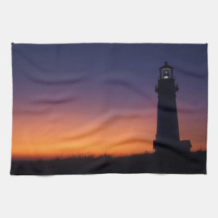 De zon valt neer op de kleurrijke horizon theedoek