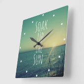 De zonneslagenstrand opzuigen vierkante klok (Hoek)