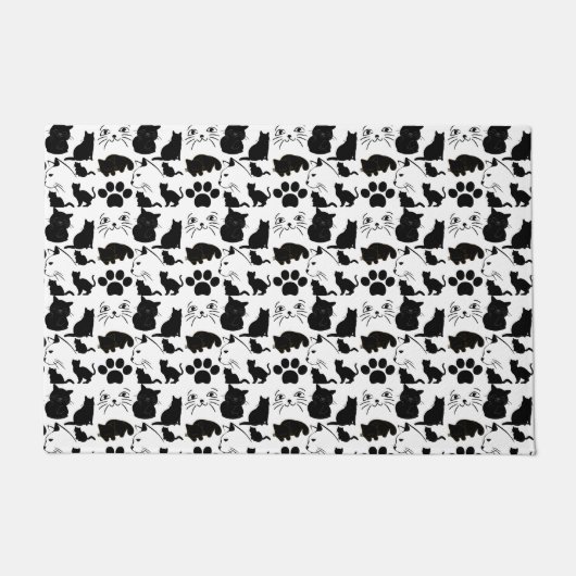 DE ZWARTE VANGSTPATRONEN DEURMAT (Voorkant)