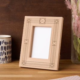 Deco geïnspireerd ontwerp met monogrammen en harte gegraveerde lijstjes