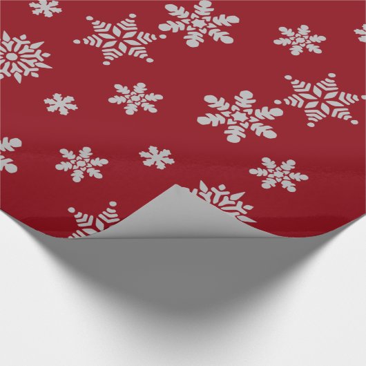 Decoratief kerstsnowflake kristal in rood cadeaupapier (Hoek)