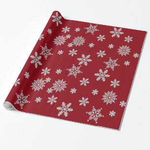 Decoratief kerstsnowflake kristal in rood cadeaupapier