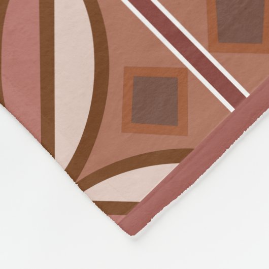 Decoratief patroon in roestspelden en terracottas fleece deken (Hoek)