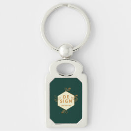 Decoratief roomkleurig zeshoekig logo op een donke sleutelhanger