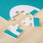 Decoratieve brieven over blauwe achtergrond legpuzzel (Zijkant)