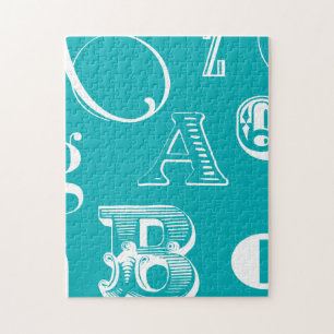 Decoratieve brieven over blauwe achtergrond legpuzzel