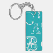 Decoratieve brieven over blauwe achtergrond sleutelhanger (Voorkant Links)