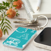 Decoratieve brieven over blauwe achtergrond sleutelhanger (Voorkant Rechts)