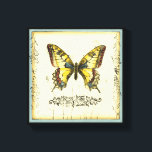 Decoratieve vlinder met wilde bloemen canvas afdruk<br><div class="desc">Een heldere,  decoratieve vlinder is het onderwerp van dit stuk van Jennifer Goldberger. Wilde bloemen worden getrokken aan de zijkanten en onder de enorme vlinder. Een mooie pastelgrens voltooit de scène. Bestel vandaag uw afdruk!</div>