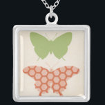 Decoratieve vlinderpatronen op de achtergrond van  zilver vergulden ketting<br><div class="desc">De crèmeachtergrond van dit stuk van Erica Vess van June staat de kleuren van de vlinderpatronen toe om van de druk af te springen. Als je van moderne kunst houdt,  of gewoon van vlinders houdt,  is dit het stuk voor je!</div>