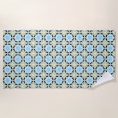 Decorative blue and cream floral patterned strandlaken (Voorkant)