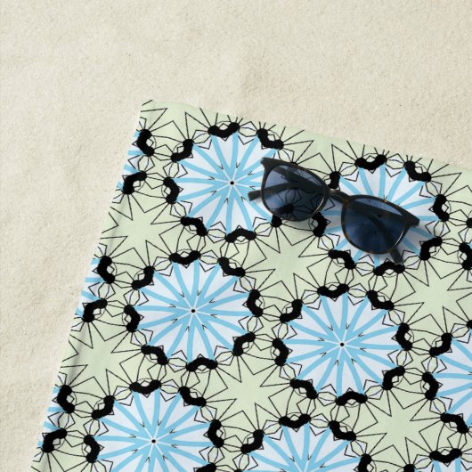 Decorative blue and cream floral patterned  strandlaken (In situ)