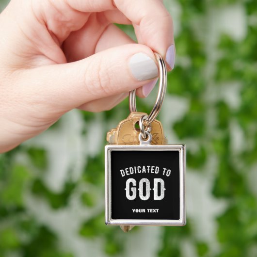 DEDICATED TO GOD COOL WHITE TEKST SLEUTELHANGER (Hand)