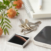 Deel van Mars op de grens van licht en donker. Sleutelhanger (Zijkant)