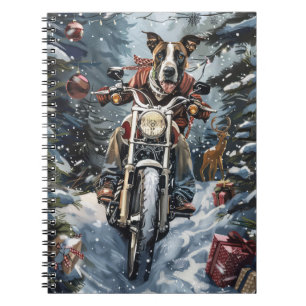 Deense hond rijdt op motorfiets met Kerstmis Notitieboek