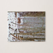 Deer in the snow, licking leg legpuzzel (Horizontaal)